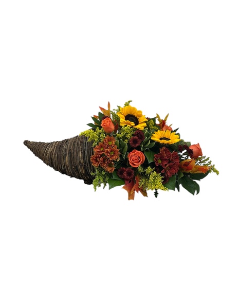 rustic cornucopia of sunflowers, chrysanthemums, gerbera daisies and lush fall foliage