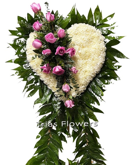 pink rose spray on top of floral heart